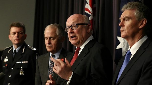 George Brandis showing his true feelings for individual privacy? Photo: Alex Ellinghausen (SMH).